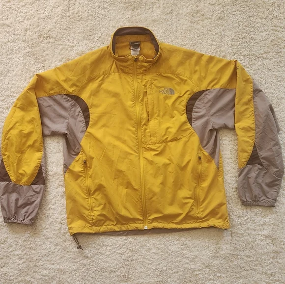 The North Face Flight SerieYellow and Gray Windbreaker.